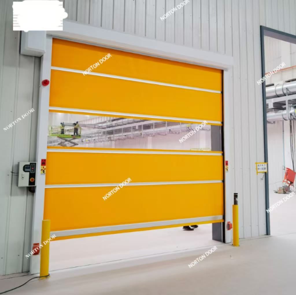 Yellow industrial roll-up door with a clear center strip in a warehouse setting