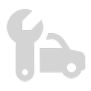 Wrench next to a car, suggesting auto repair or maintenance.