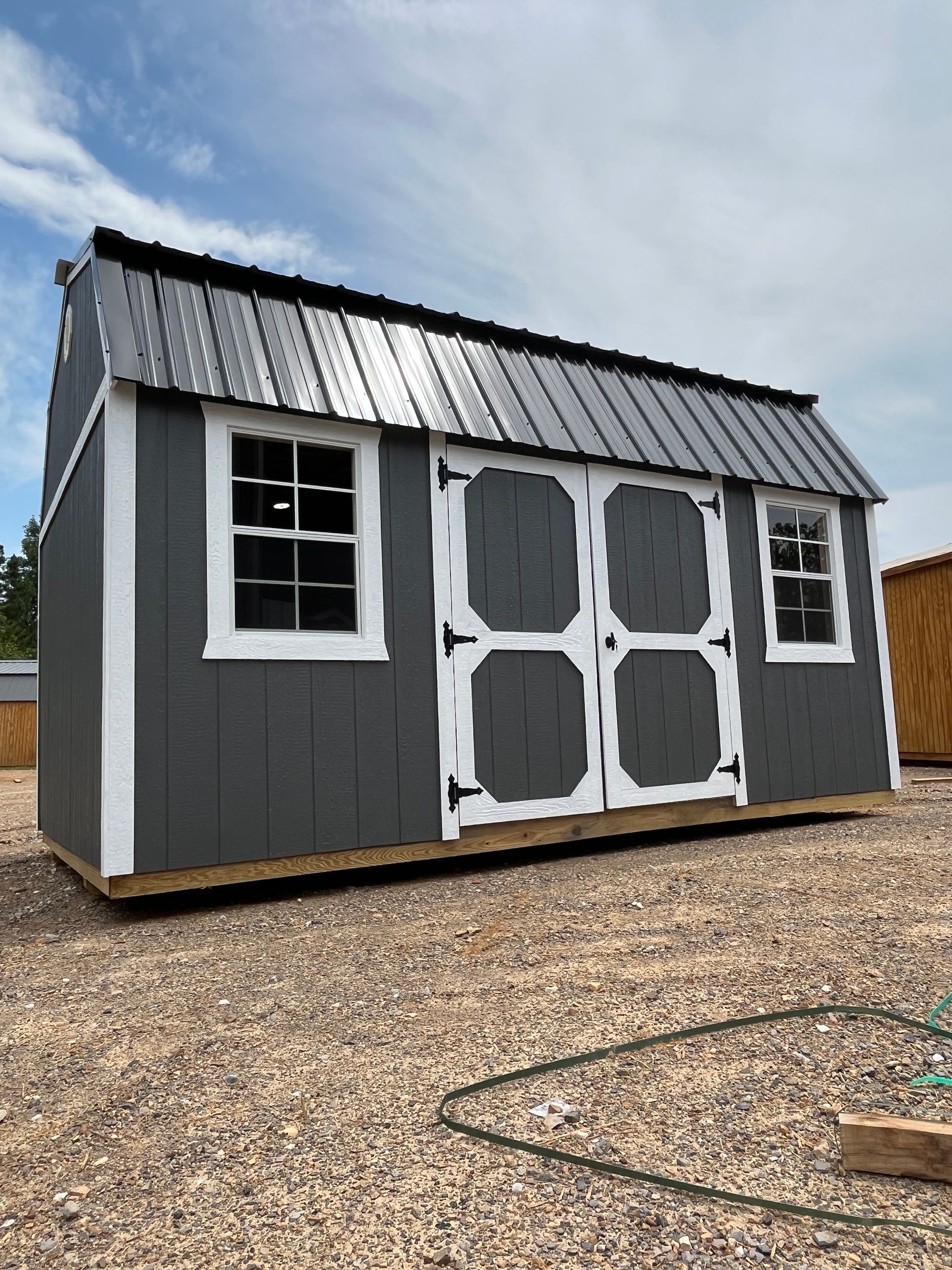 A 3d model of a small house with a porch