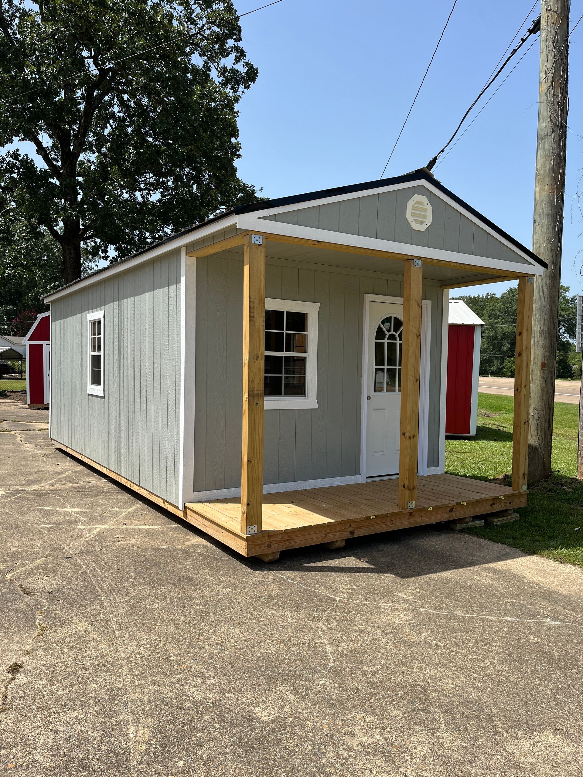A 3d model of a small house with a porch