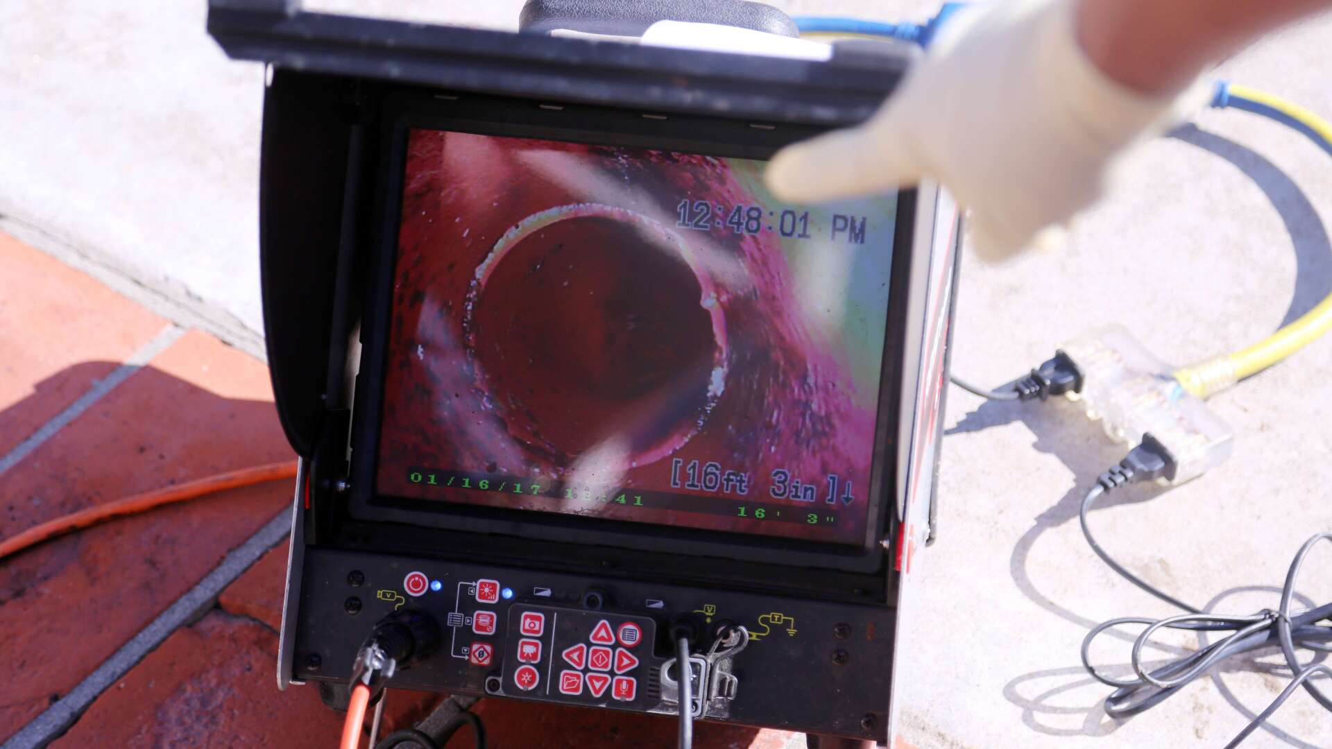 Snake camera monitor showing the inside of a pipe