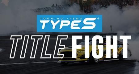 A yellow car is driving down a road next to the words title fight