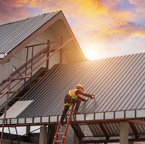 New Roof Installation — Council Bluffs, IA — Eric Adams Contracting, LLC Residential roofing contractors working on a home in Council Bluff, IA