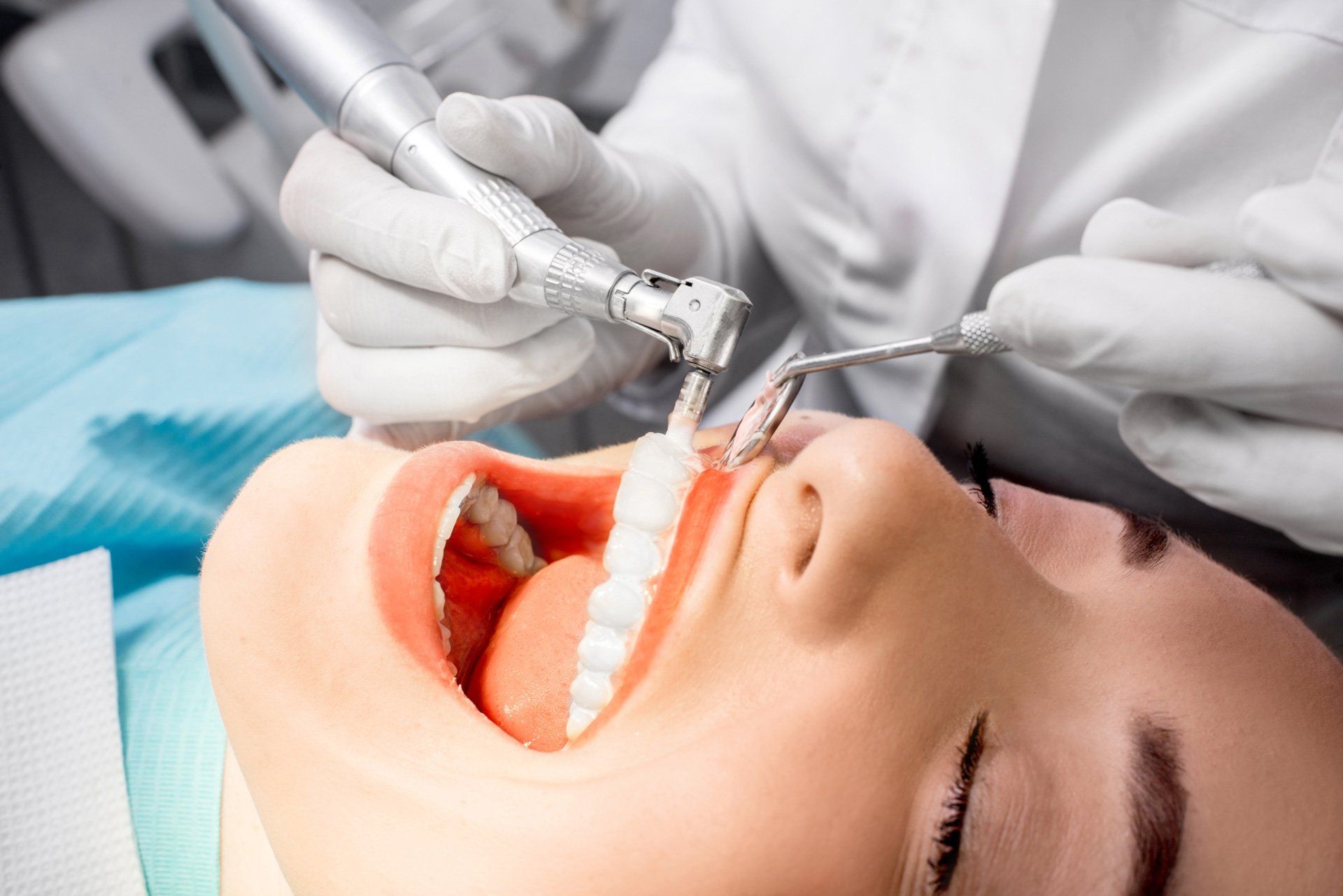 A dentist doing some teeth grinding on a patient – Blacktown, NSW – Smiles for All A dentist doing some teeth grinding on a patient – Blacktown, NSW – Smiles for All
