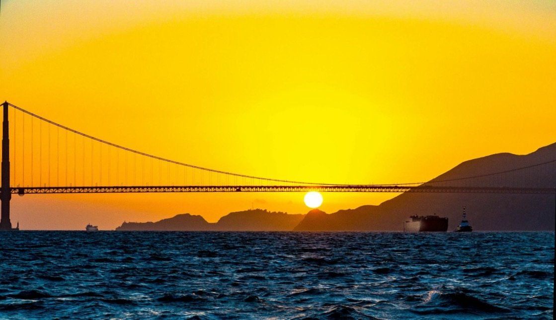 A golden sunset over the Golden Gate Bridge.
