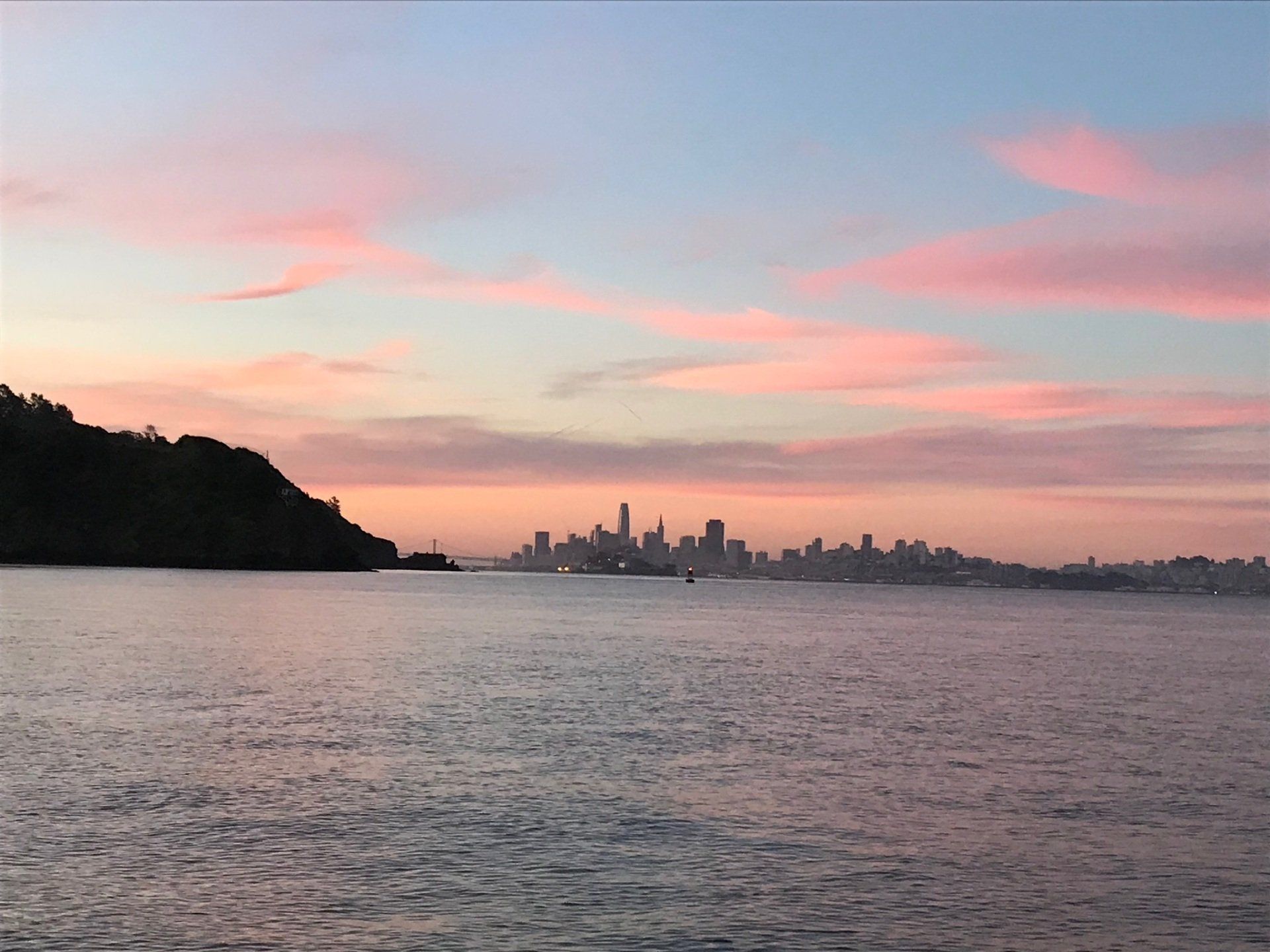 Pink sunset with a view of San Francisco.