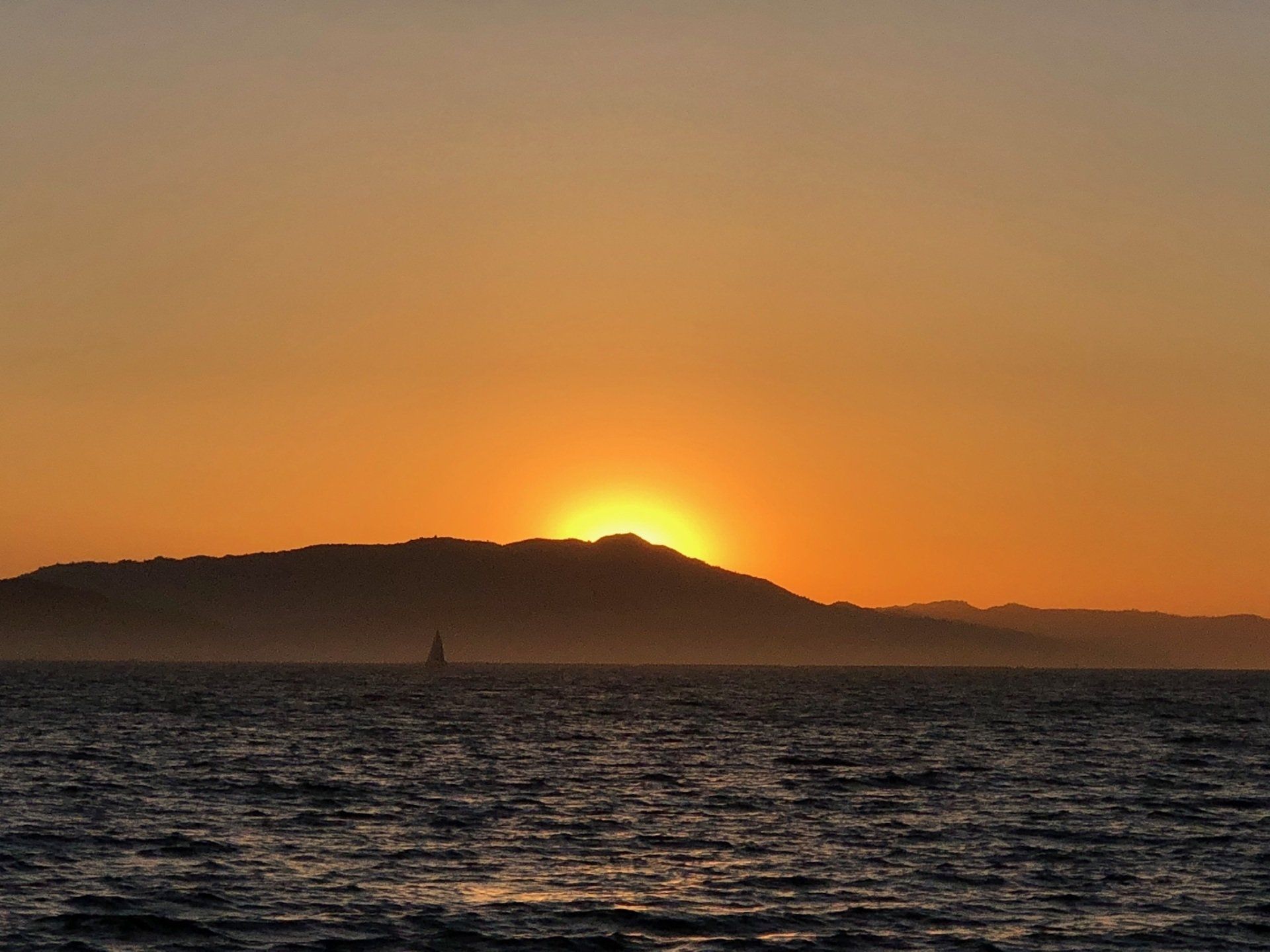 A golden sunset of Mount Tam.