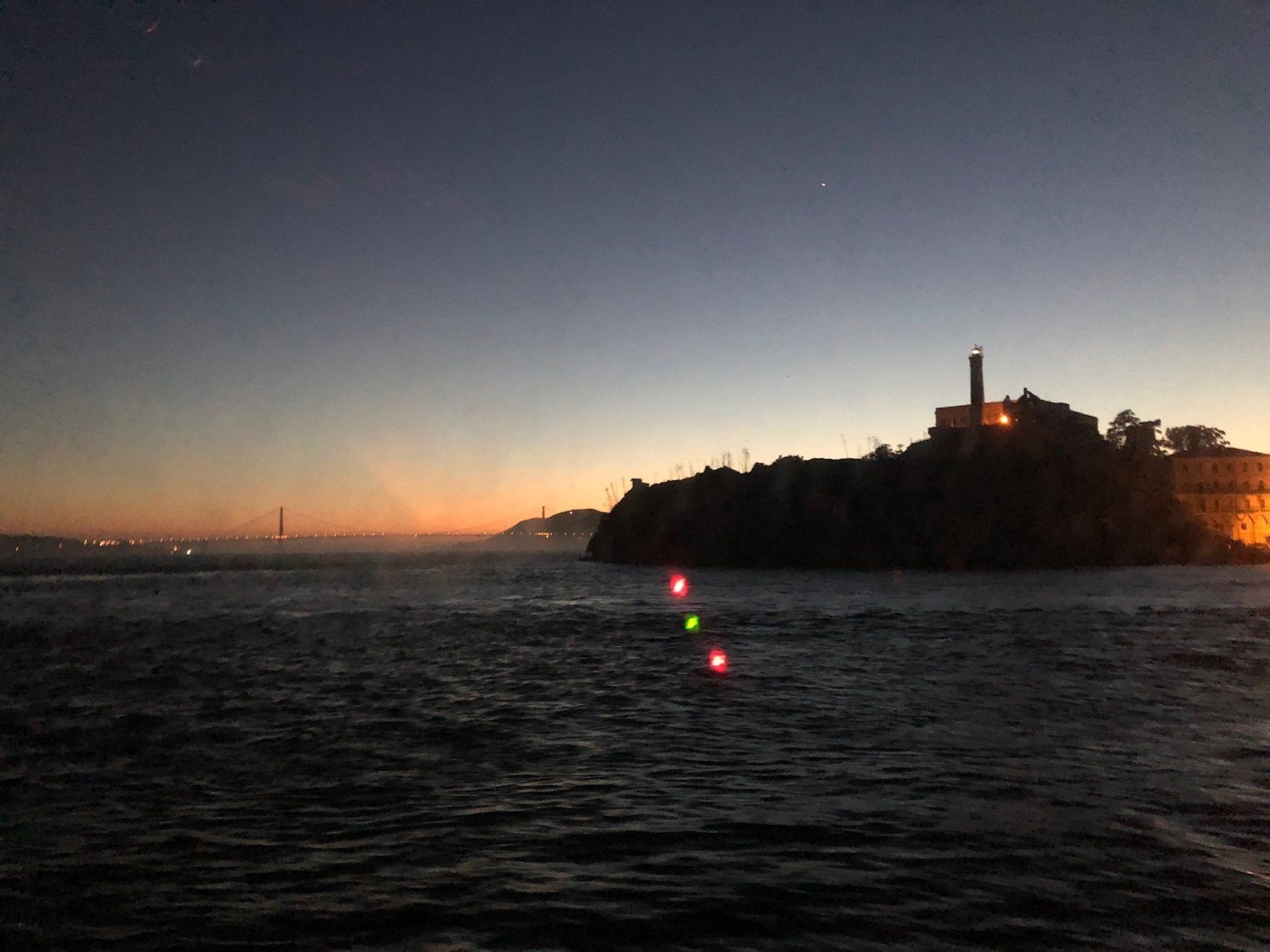 Sunset over Coit Tower along the San Francisco waterfront.