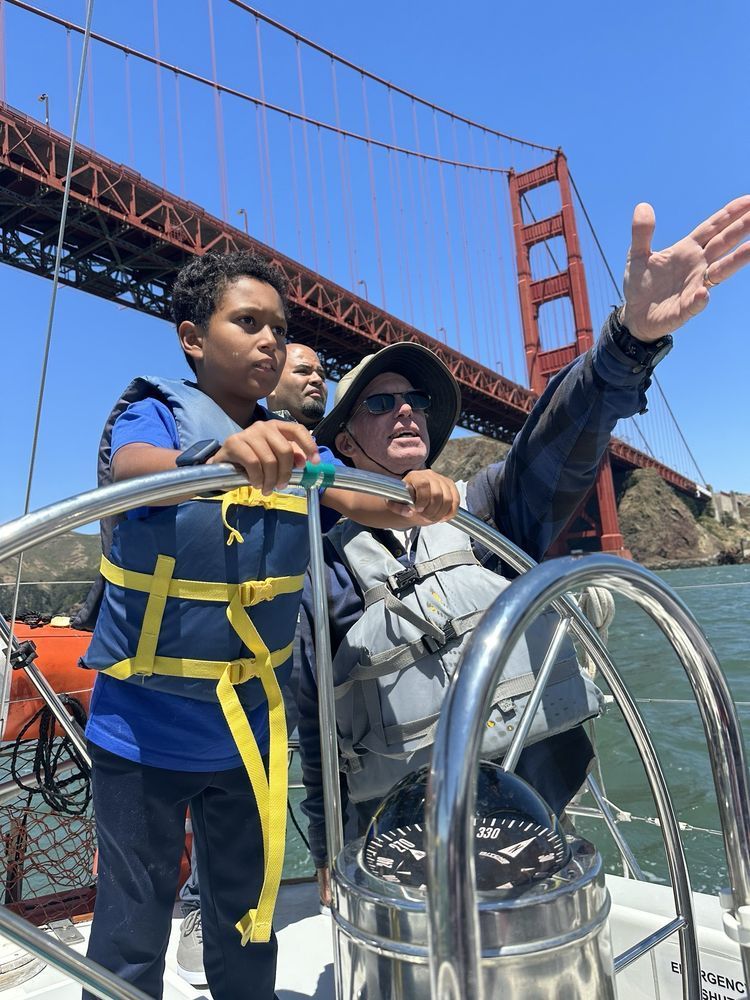 Kids leaning to sail with Captain Kirk.