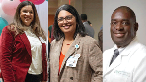 Three people smiling; woman in red blazer, woman in patterned blazer, man in white coat.