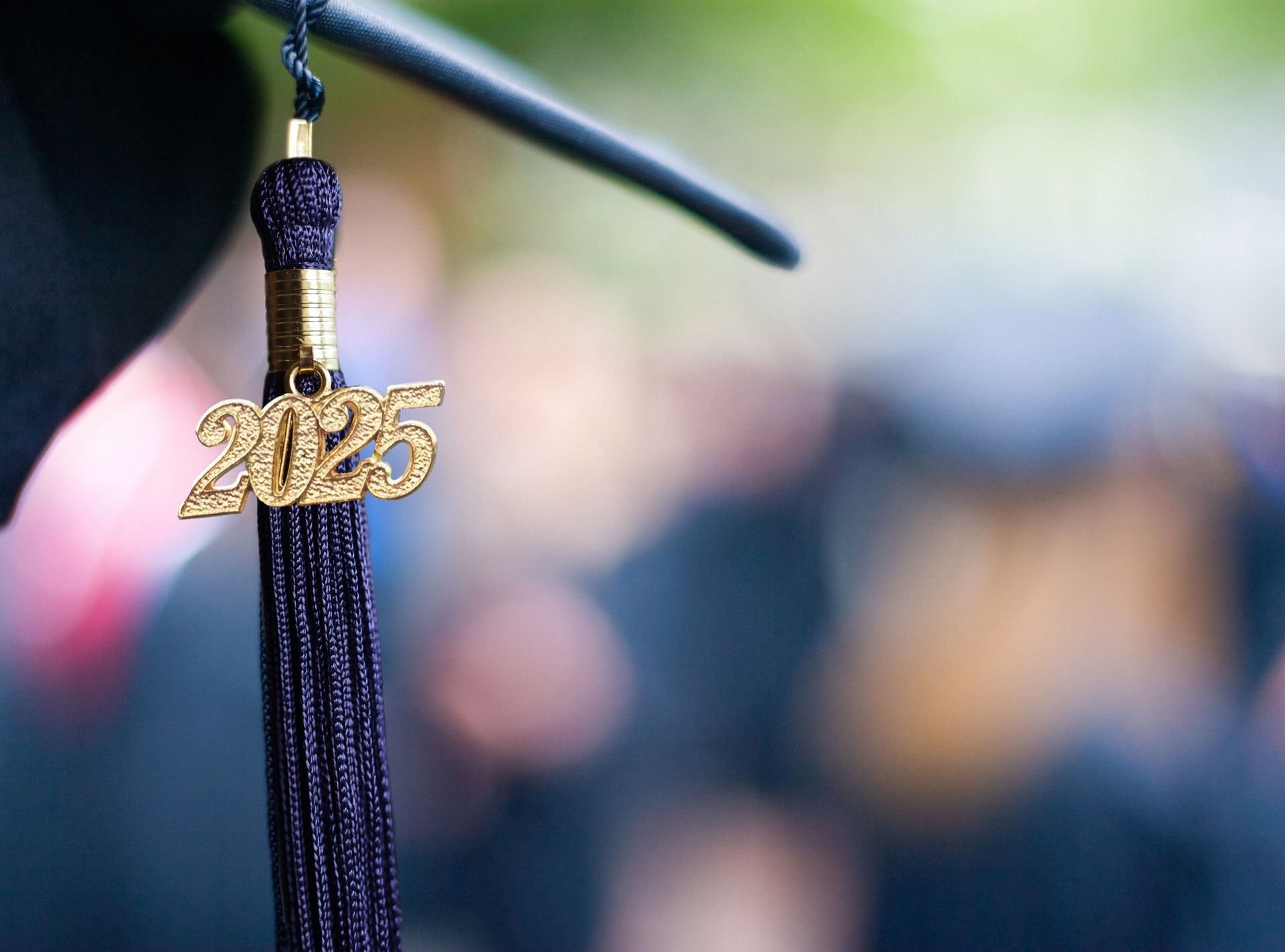 Black graduation tassel with gold