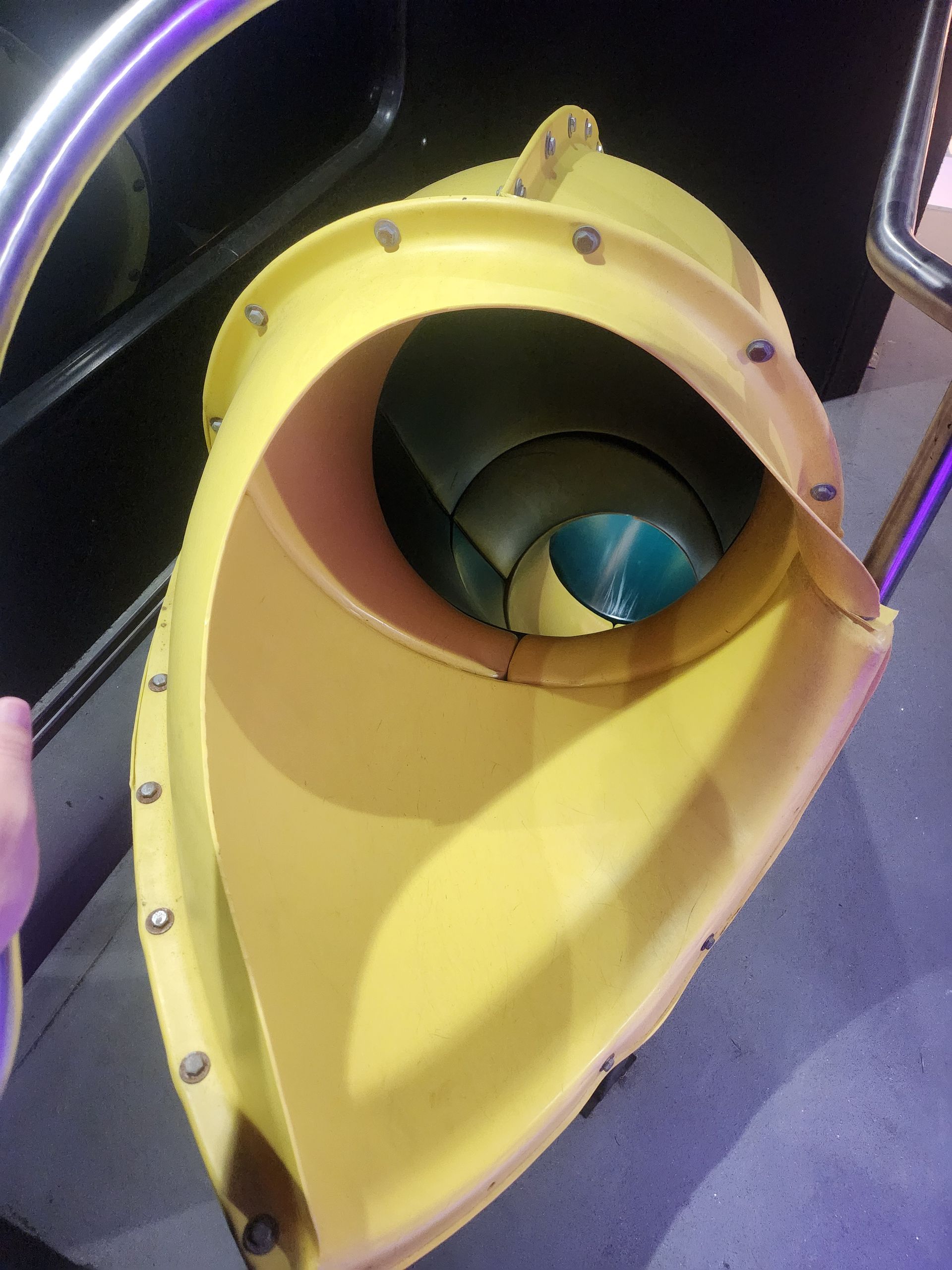A yellow object with a spiral inside of it