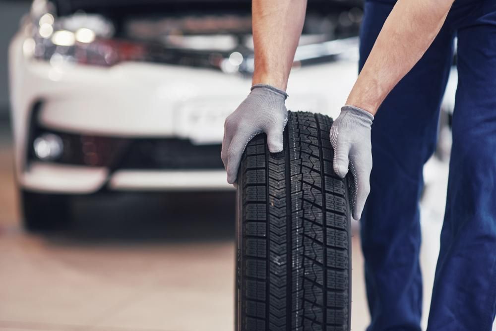 Rolling a Car Wheel: A Professional Tyre Service in Richmond Valley — Richmond Valley Tyres In Casino, NSW