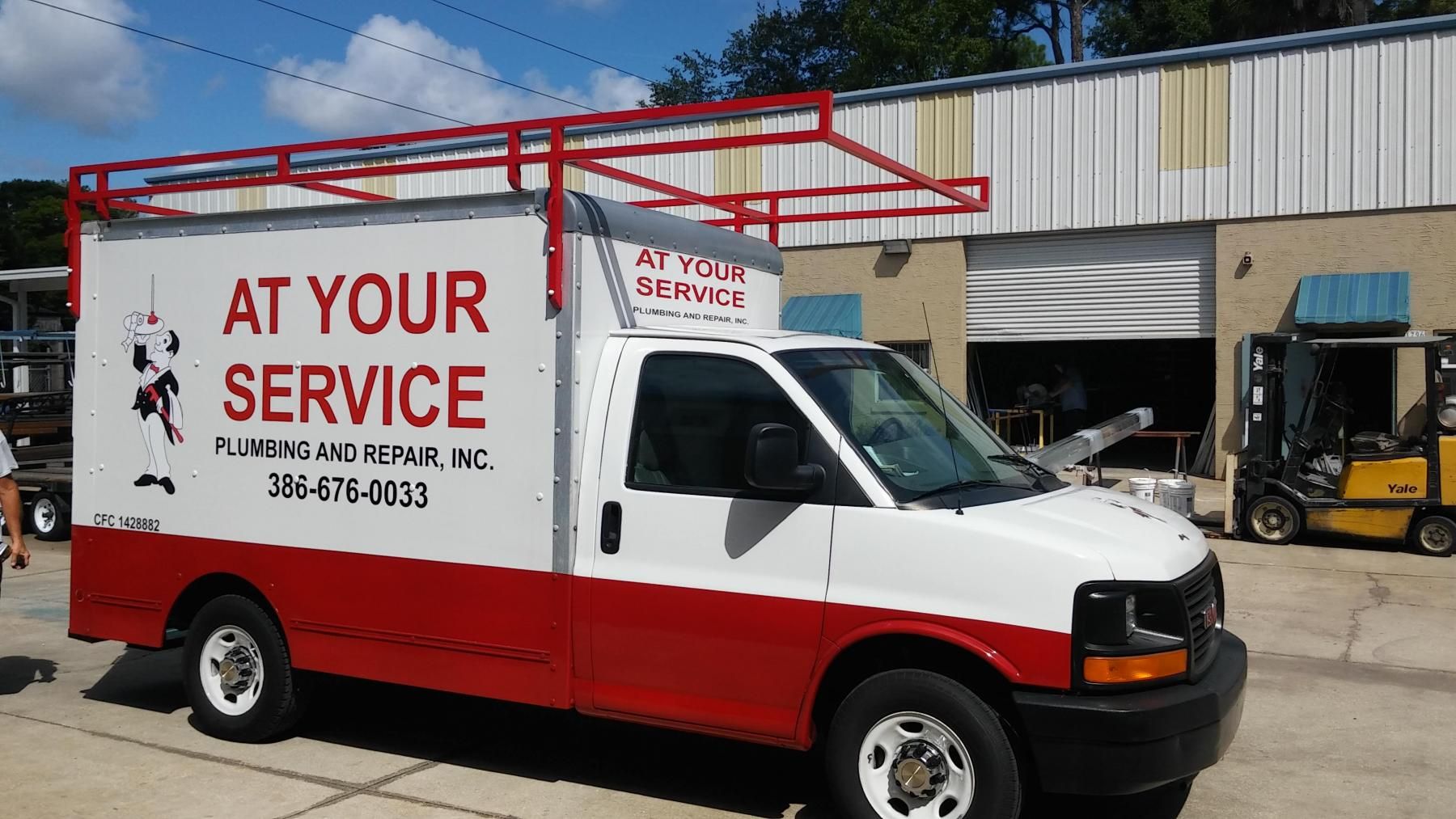 White and red service truck with