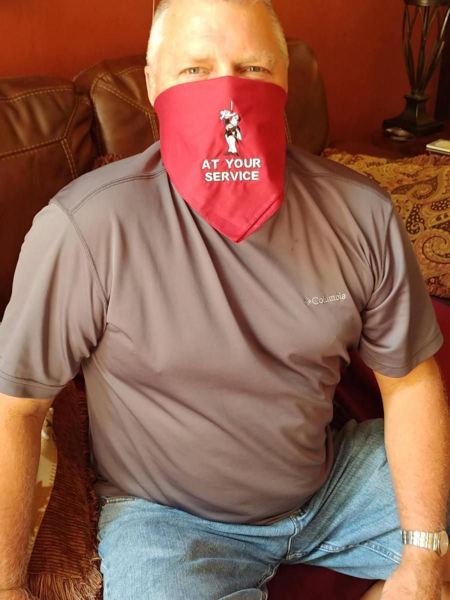 Man wearing a red bandana with