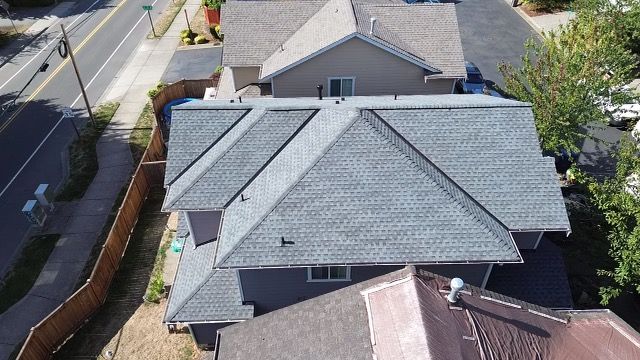 An aerial view of a house with a new roof taken by local roofer, Riverside Roofing & Gutters in Marysville WA