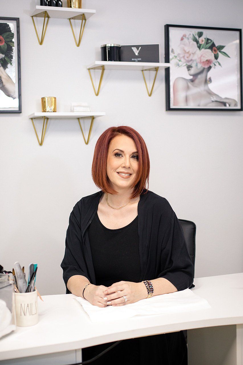 Heather, Nail Technician, at Iconic Beauty Miami