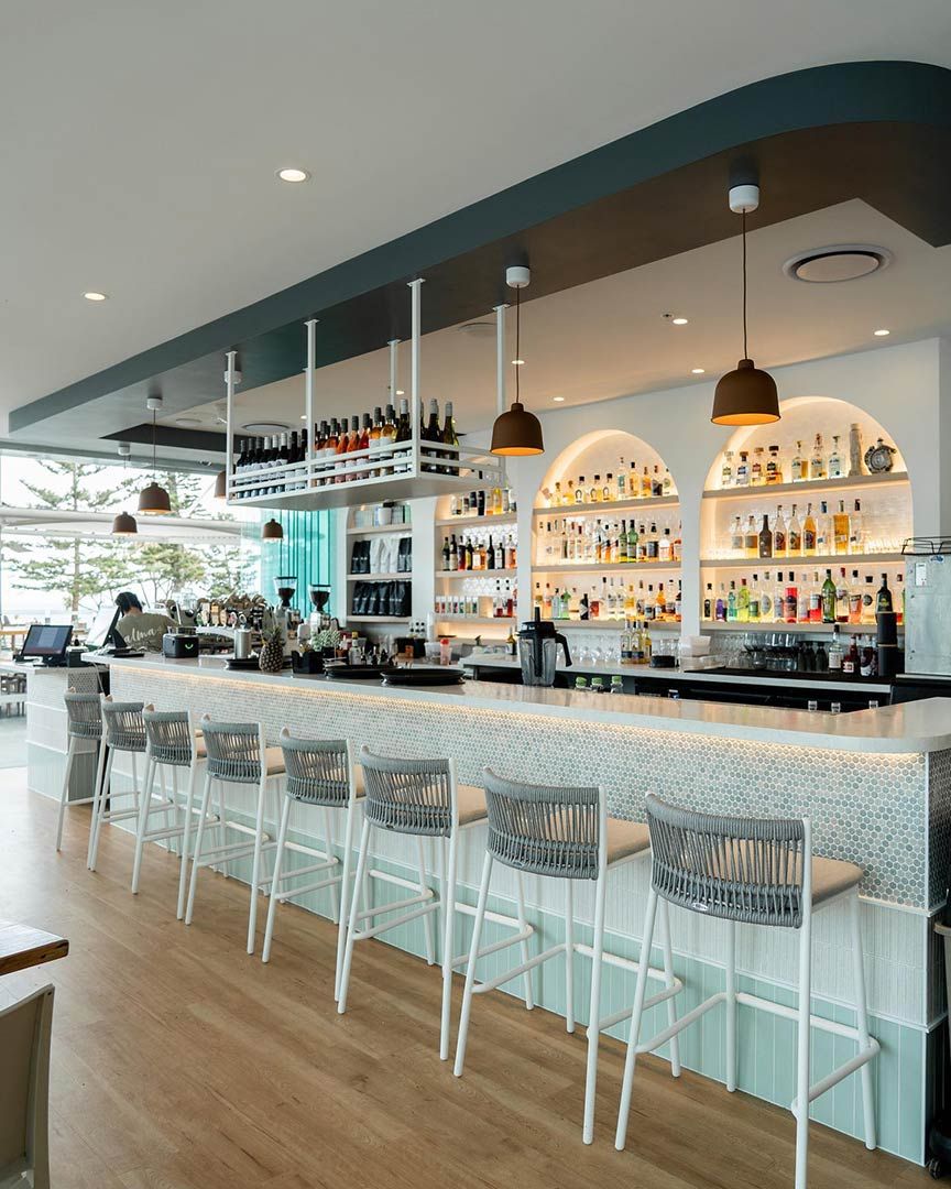 A Restaurant With a Long Bar and Stools — JIC Projects Pty Ltd in Runaway Bay, QLD