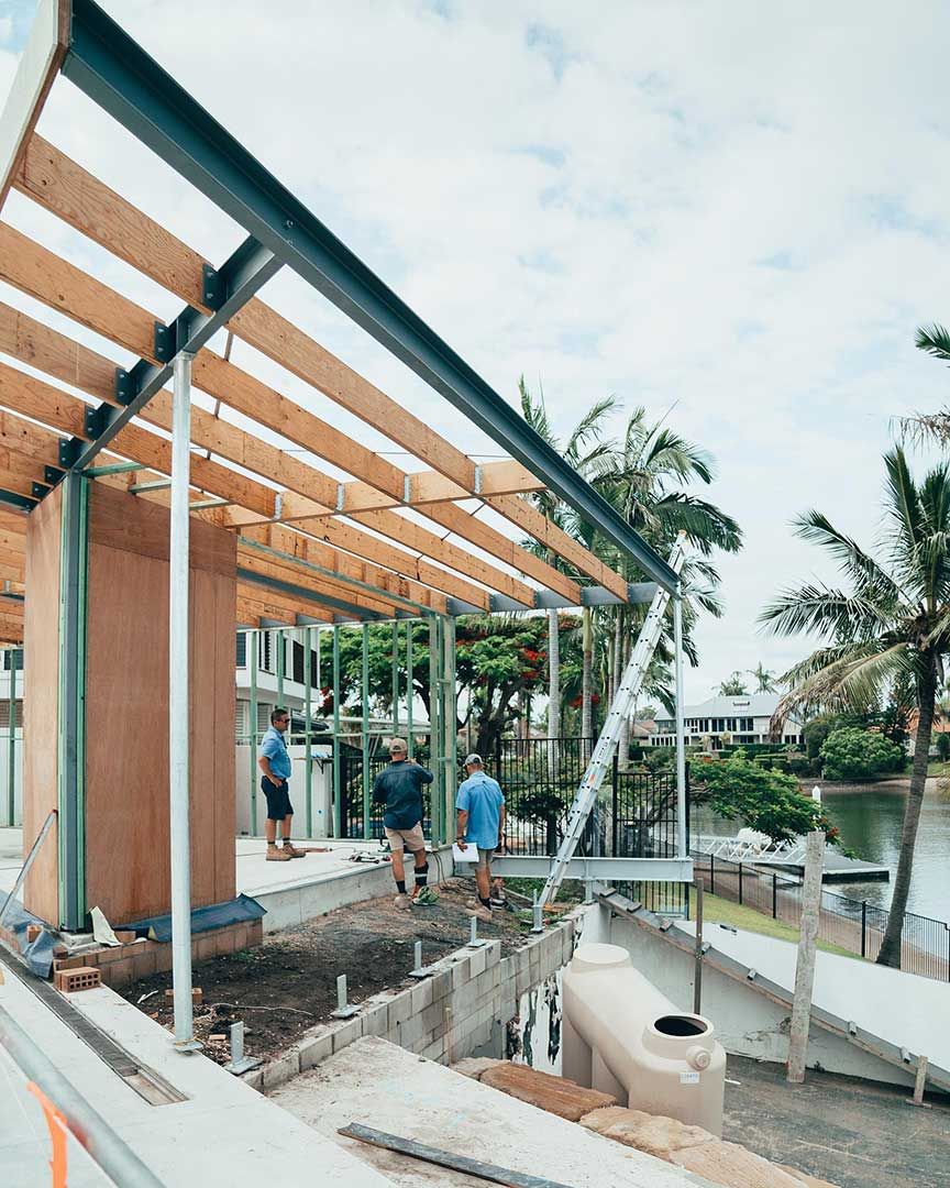 A Group of People Are Working on a Building Under Construction — JIC Projects Pty Ltd in Runaway Bay, QLD