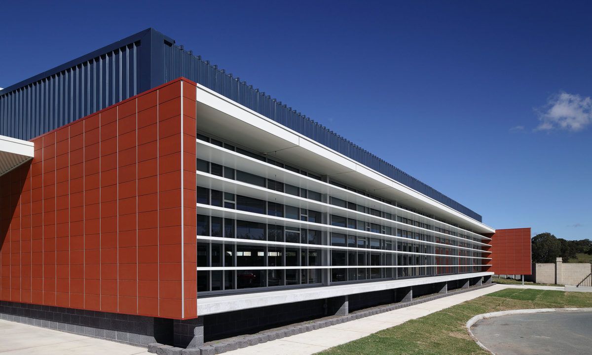 A Modern Building With a Clear Blue Sky in the Background — JIC Projects Pty Ltd in Runaway Bay, QLDÂ