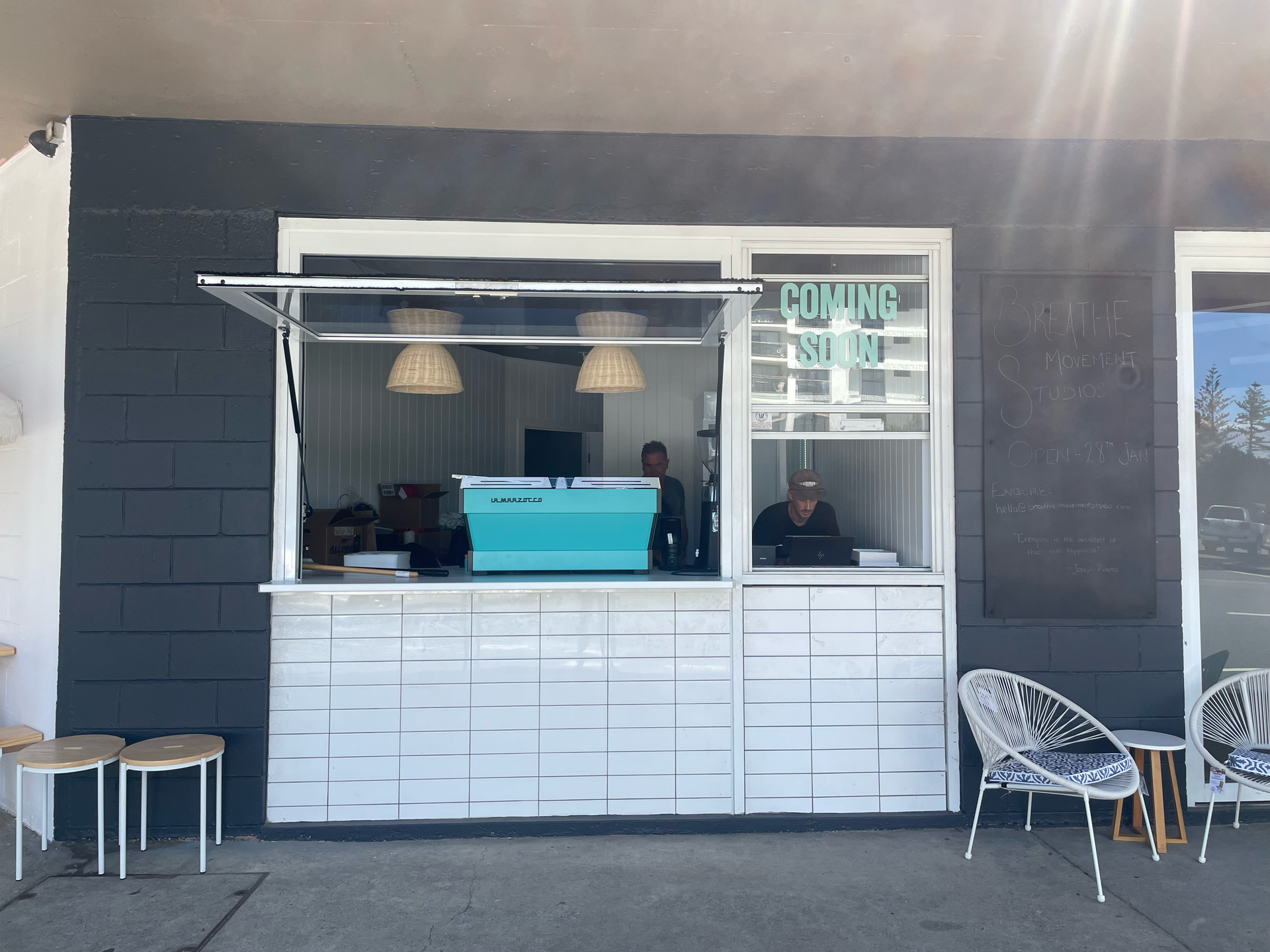 A Small Storefront With a Turquoise Coffee Machine — JIC Projects Pty Ltd in Runaway Bay, QLD