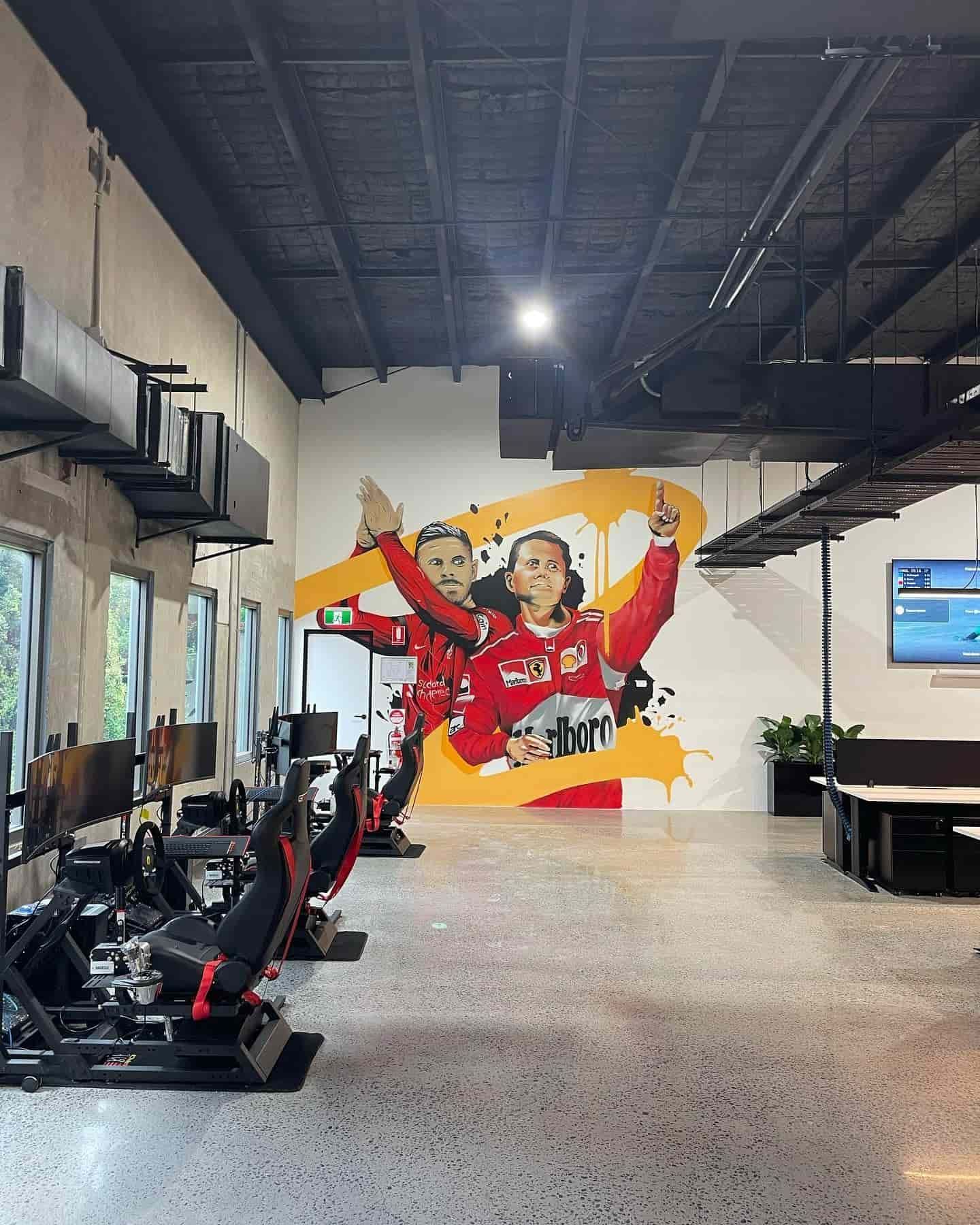 A Large Room With a Mural on the Wall and a Lot of Chairs — JIC Projects Pty Ltd in Runaway Bay, QLD