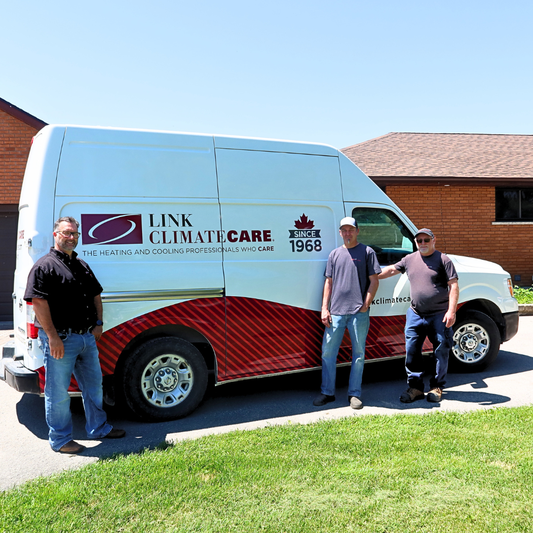 local HVAC company in beaverton standing in front of work van