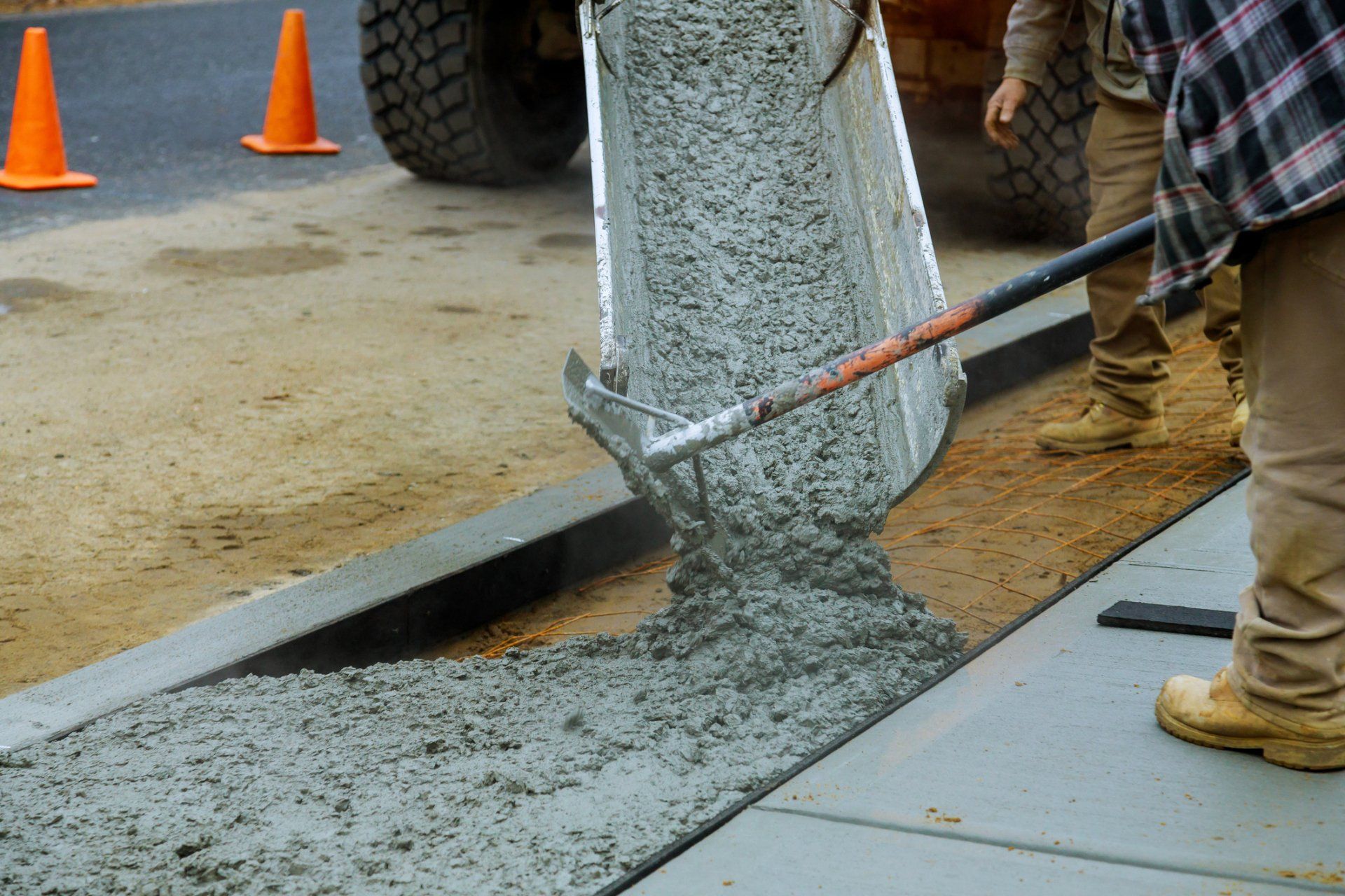 Worker Working For Concrete Pavement For Ground Flooring Construction - Allen, TX - Alpha Foundation Repair LLC
