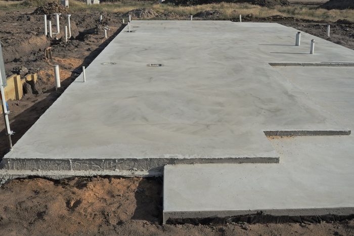 Man Placing Cinder Block - Allen, TX - Alpha Foundation Repair LLC Man Placing Cinder Block - Allen, TX - Alpha Foundation Repair LLC