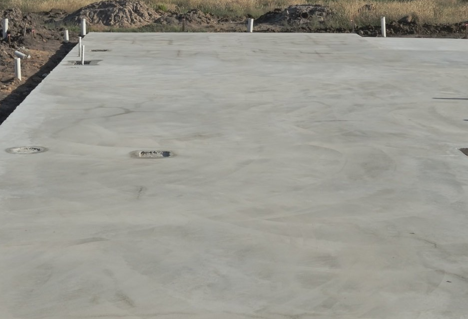 Worker Working For Concrete Pavement For Ground Flooring Construction - Allen, TX - Alpha Foundation Repair LLC