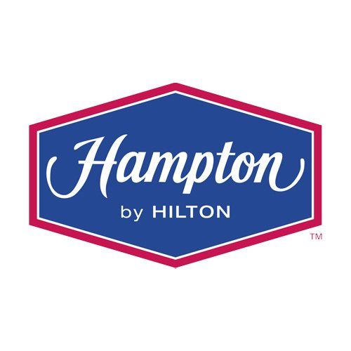 The logo for hampton by hilton is a blue and red hexagon.