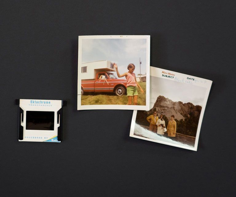 Square prints of family and a photo slide