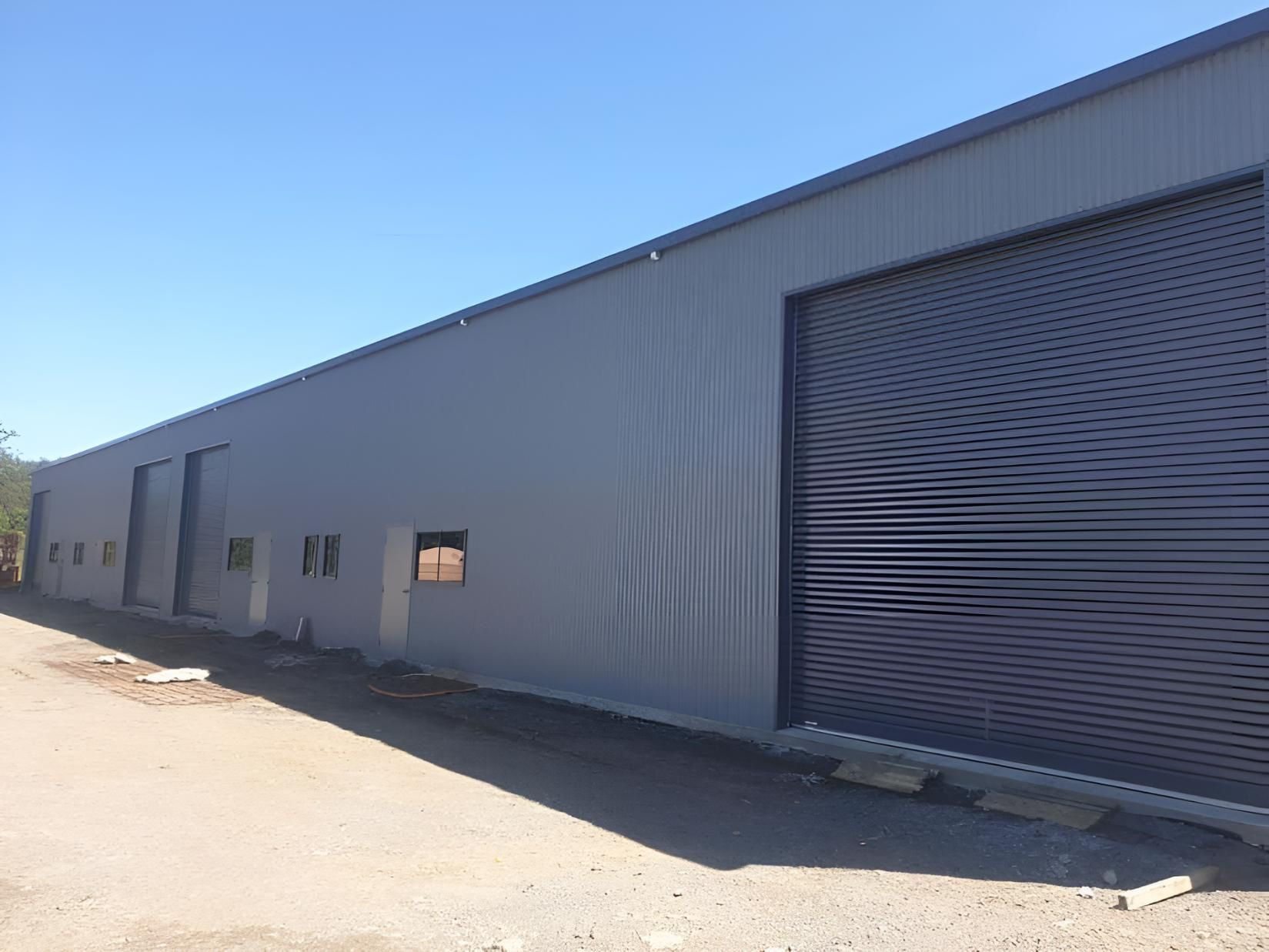 A Large Building With a Large Garage — Hastings Valley Sheds in South West Rocks, NSW