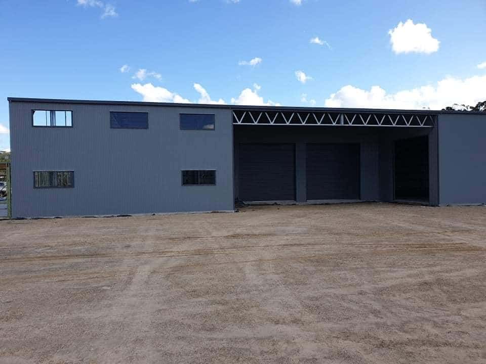 A Large Shed With a Lot of Windows — Hastings Valley Sheds in Wauchope, NSW