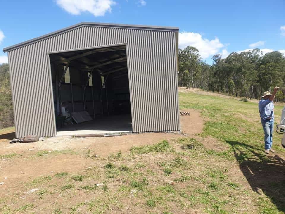 A Man in a Cowboy Hat is Standing — Hastings Valley Sheds in Port Macquarie, NSW