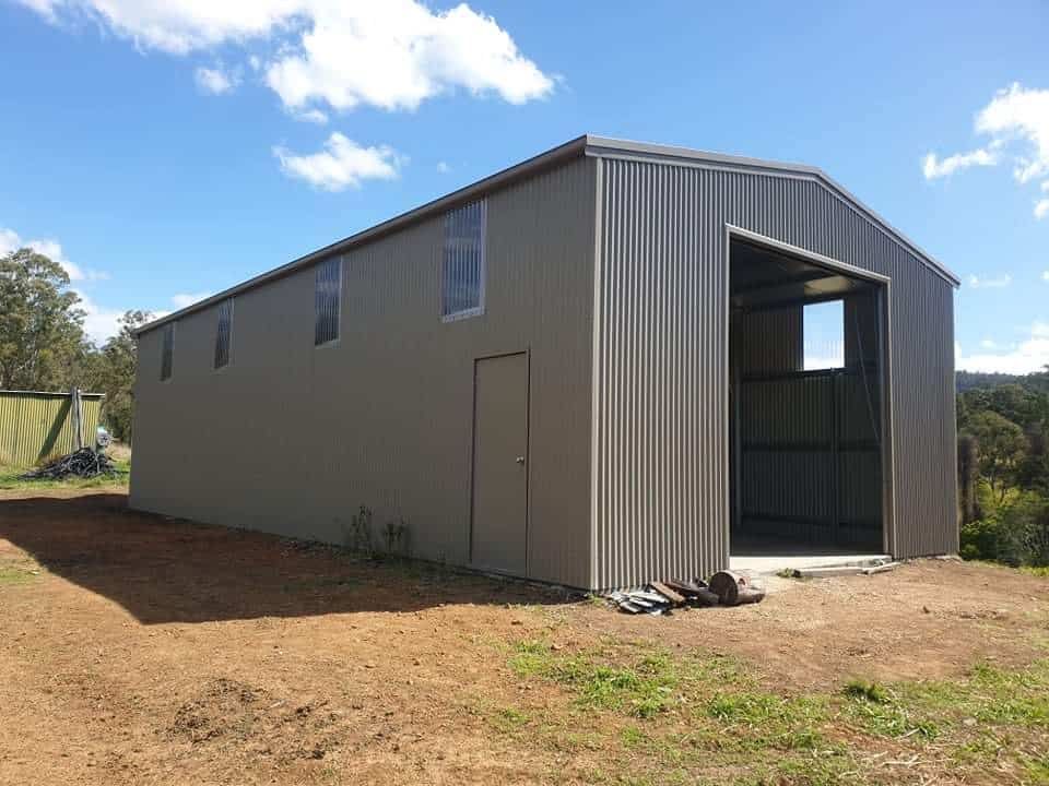 A Large Metal Shed With a Large — Hastings Valley Sheds in South West Rocks, NSW