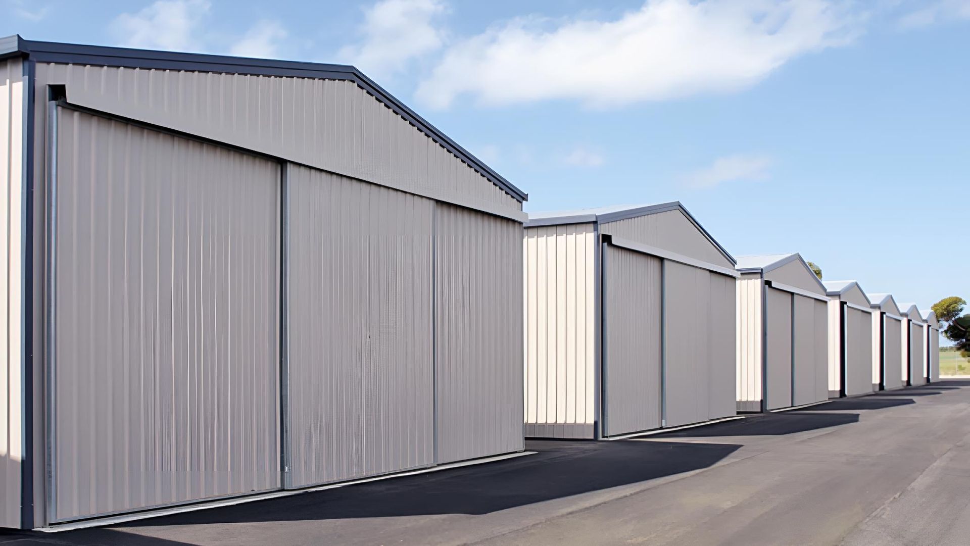 A Row of Sheds With Sliding Doors — Hastings Valley Sheds in Kempsey, NSW