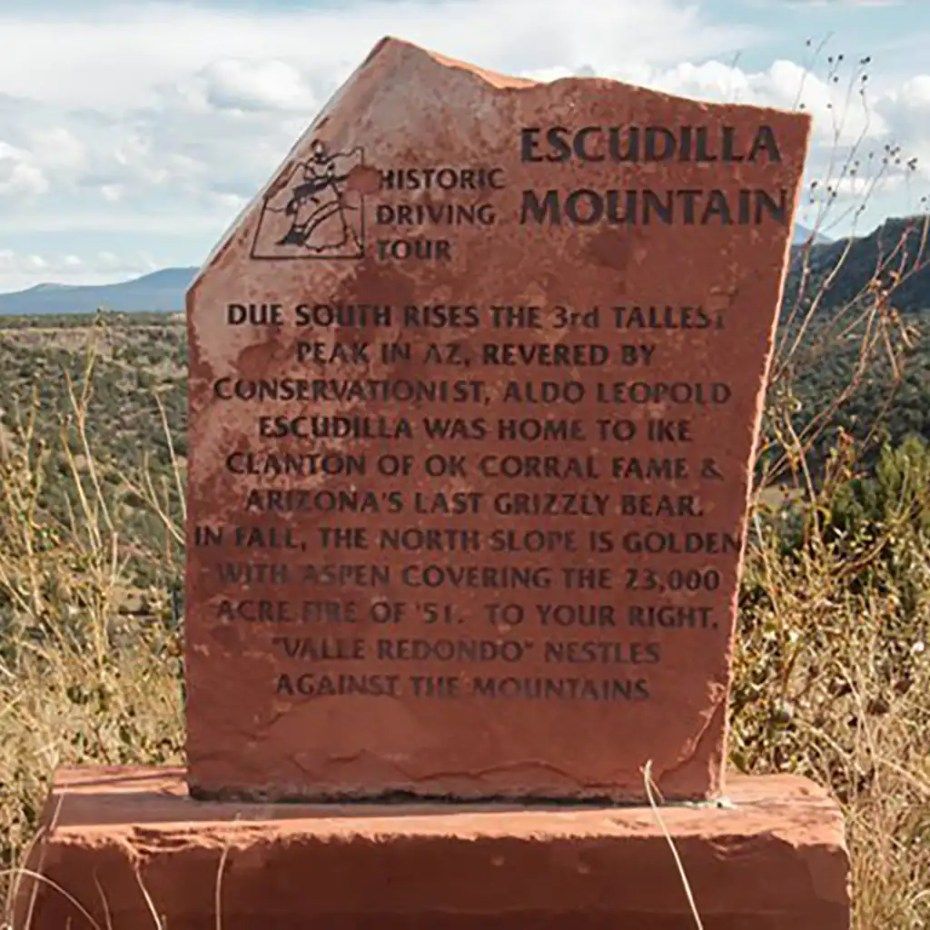 A large rock with escudilla mountain written on it