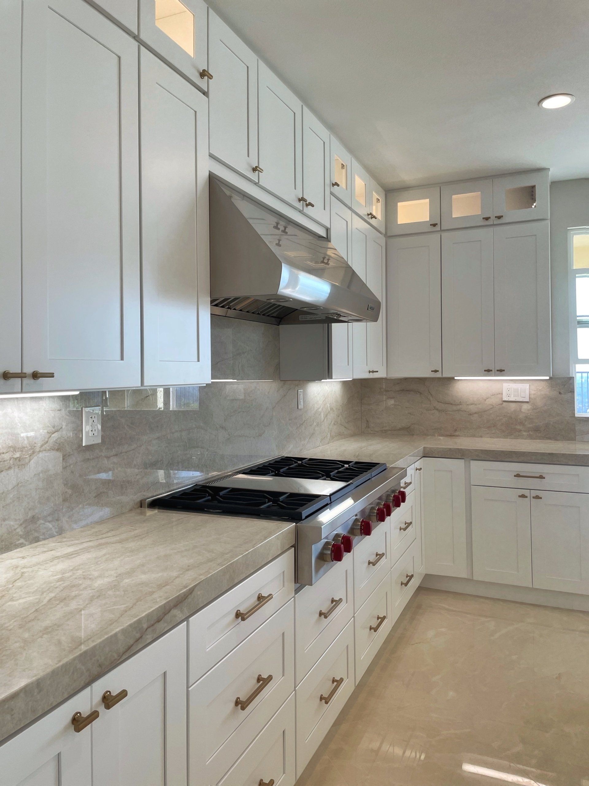Kitchen Remodeling Contractor White Shaker Cabinets Subway Tile Backsplash Calacatta quartz countertop kitchen island Laguna Niguel, CA