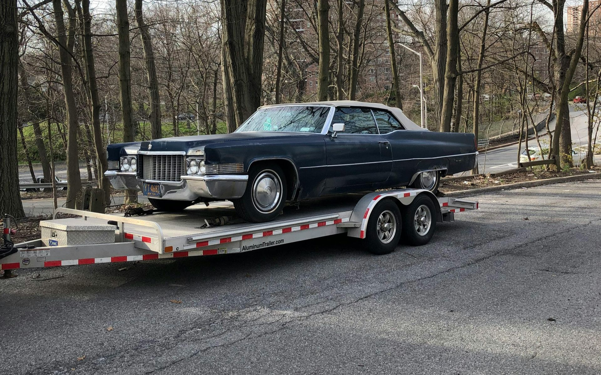 Order your tow truck in Beamsville here today! Classic car on flatbed tow truck