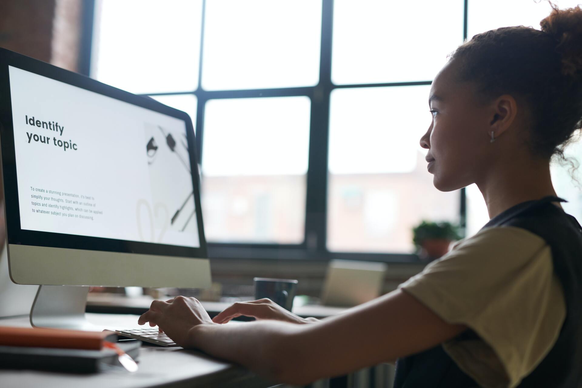 A student types on a computer