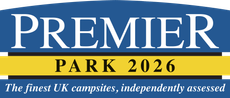 Premier Park logo with white text on blue, gold, and black backgrounds, 