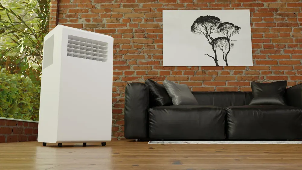 Hvac Services - A living room with a black couch and a portable air conditioner.