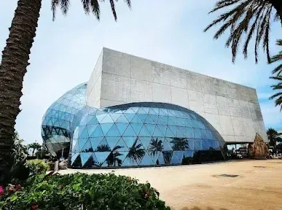 Hvac-Contractor-Bradenton-A large dome shaped building with palm trees in front of it