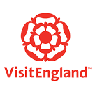 The visit england logo has a red flower on it.