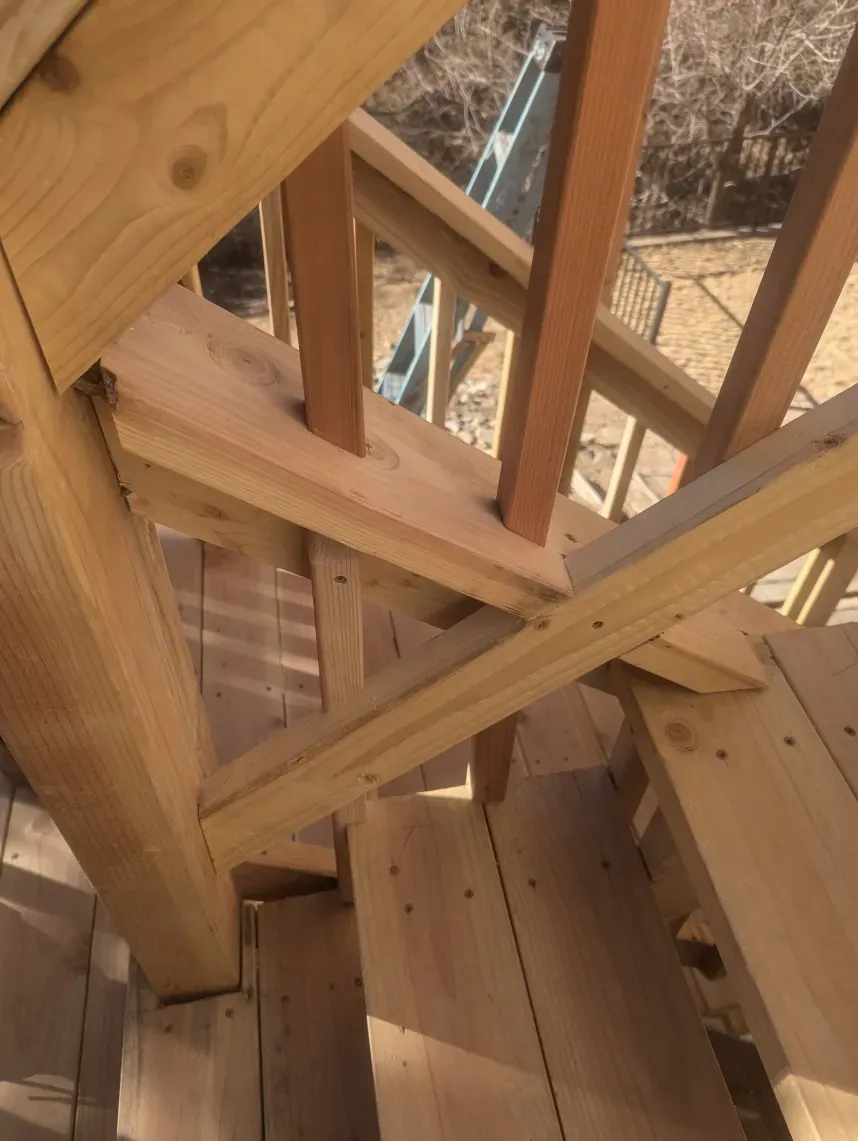 A close up of a wooden staircase under construction