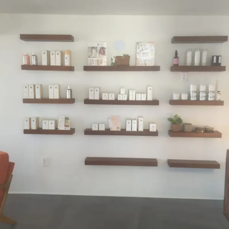 A wall of shelves filled with various beauty products