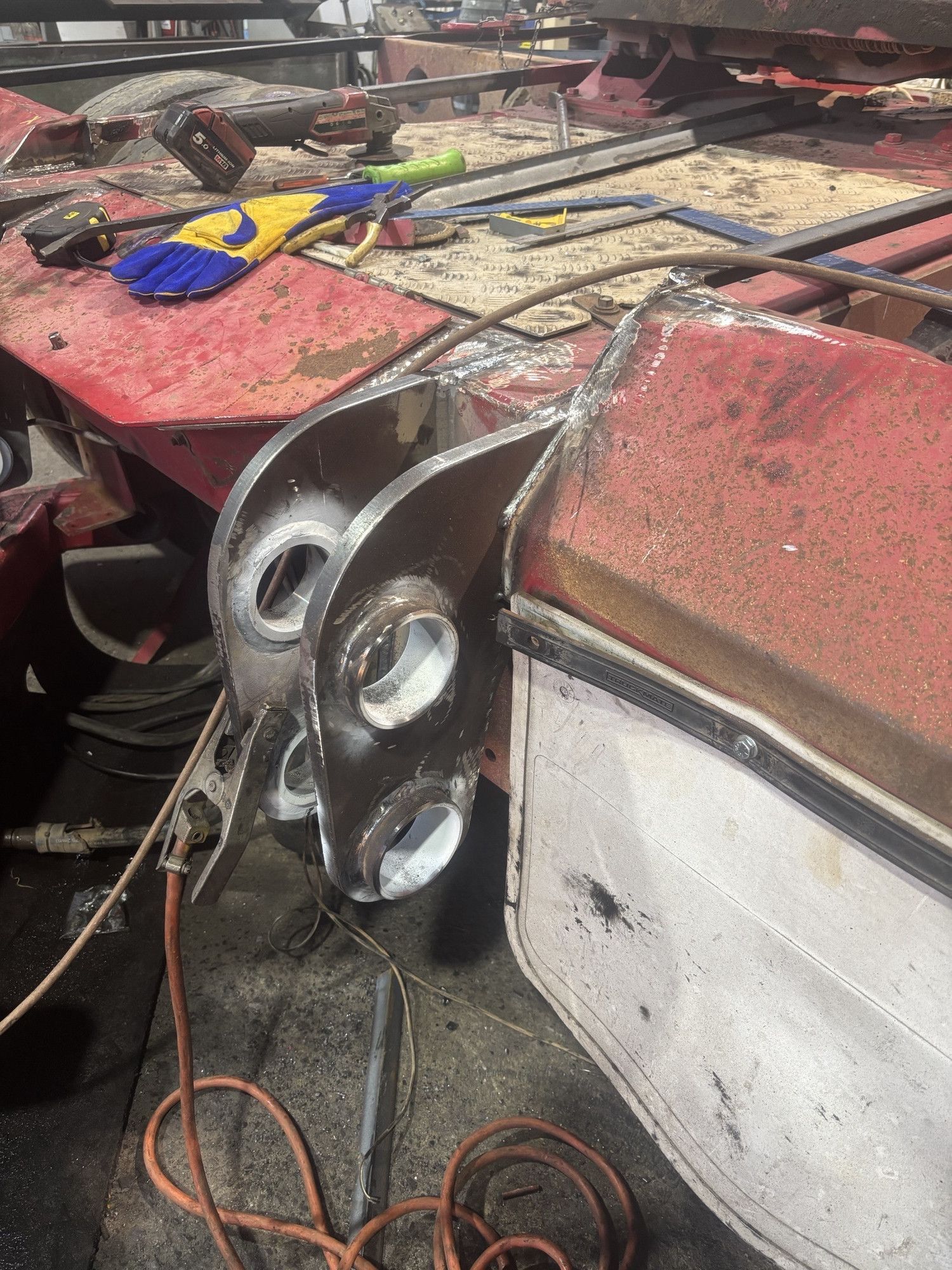 Red and White Work Bench with Micellaneous Tools — Harris Engineering Services CQ In Gracemere, QLD