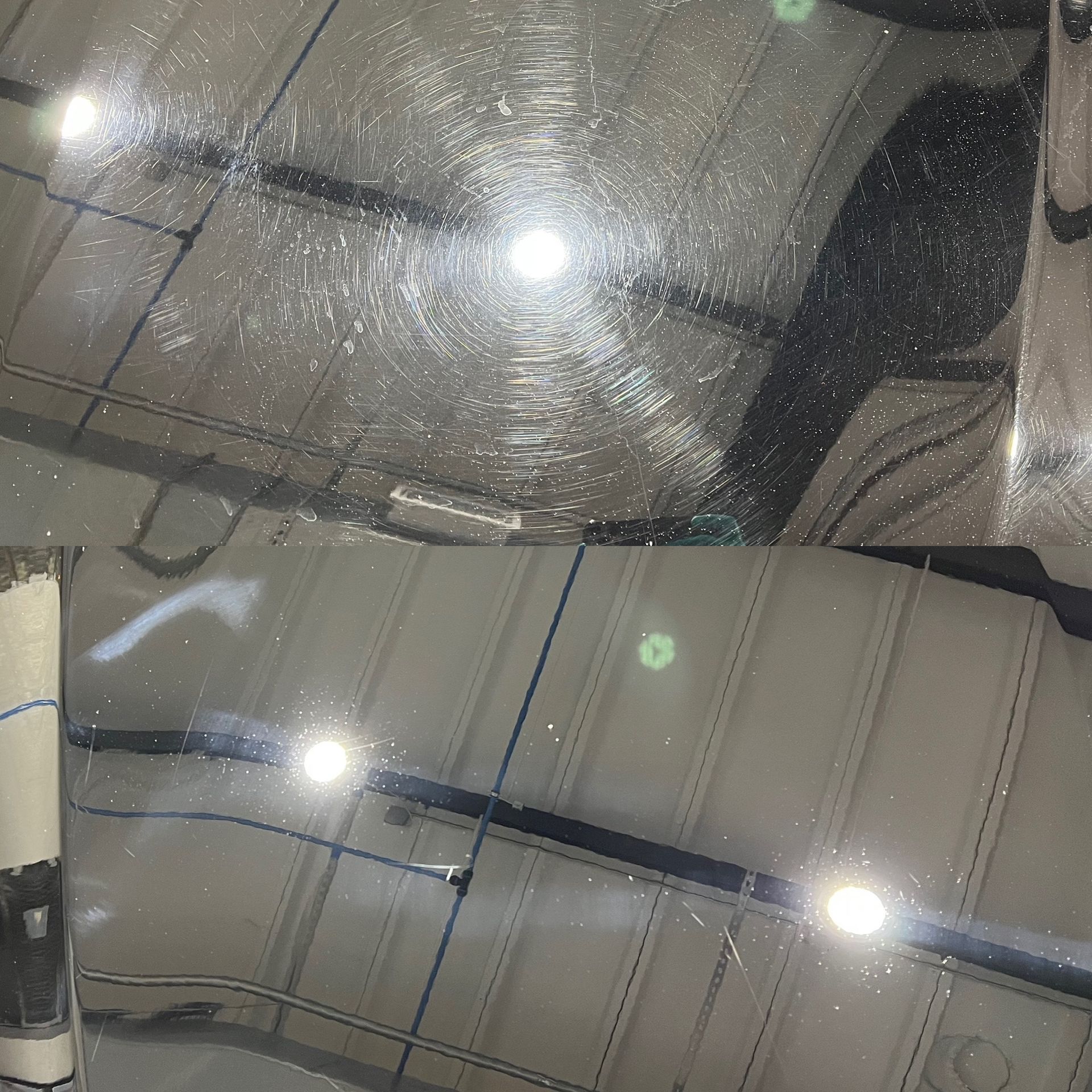 Black car roof with swirl marks, reflecting bright lights and garage interior.