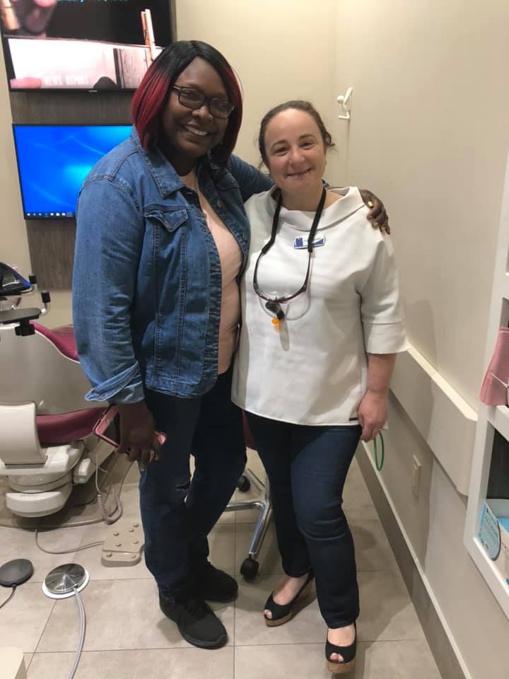 Dr. Lyuba Taft and her patients smiling